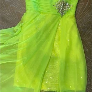 Lime green/yellow prom dress. Short sequin dress under and long sheer overlay.